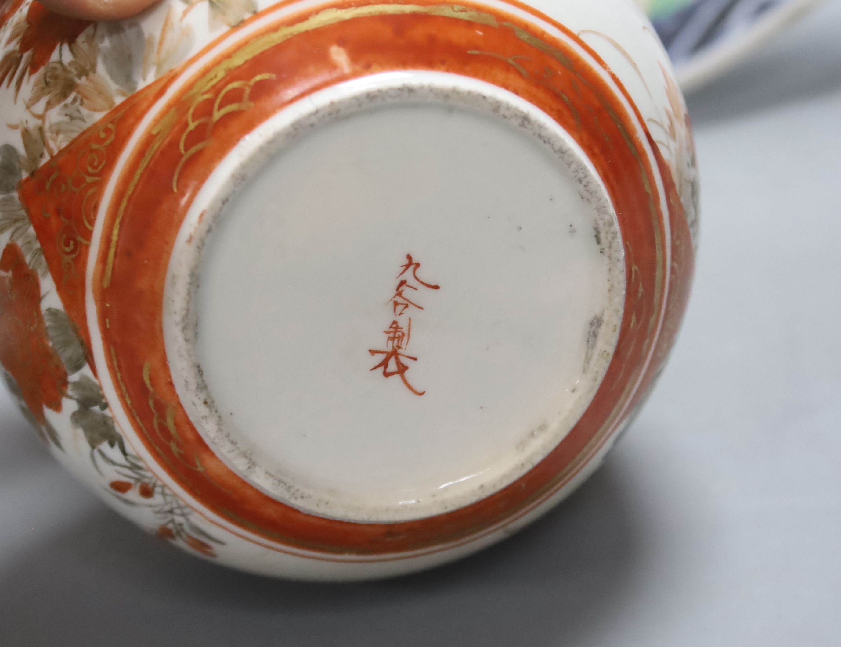 A Japanese Imari charger, a Kutani jar and cover and a Satsuma vase, diameter 40cm